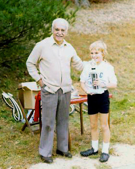 Charlie receiving a trophy from long-time race promoter Vito Perucci for winning the 1979 overall "midget" championship at the Westbury Training Series.